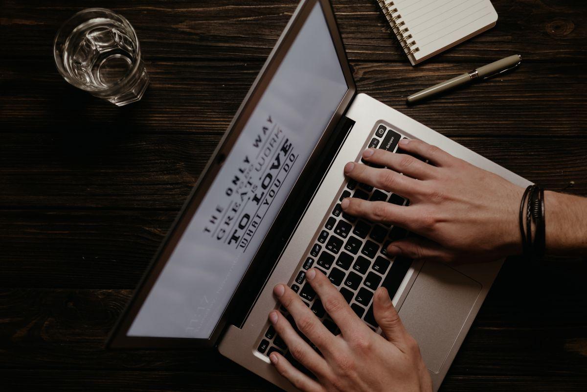 Drafting blog content with a laptop