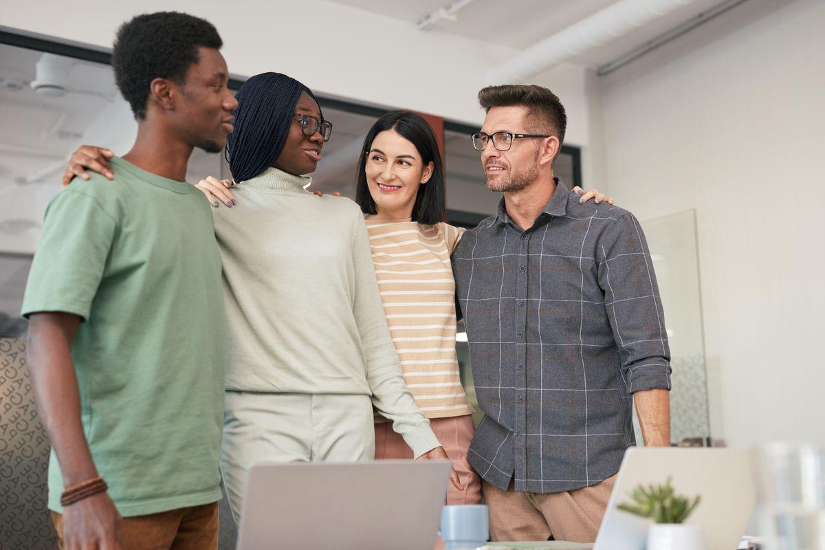 Cross-functional marketing team collaborating on a client strategy