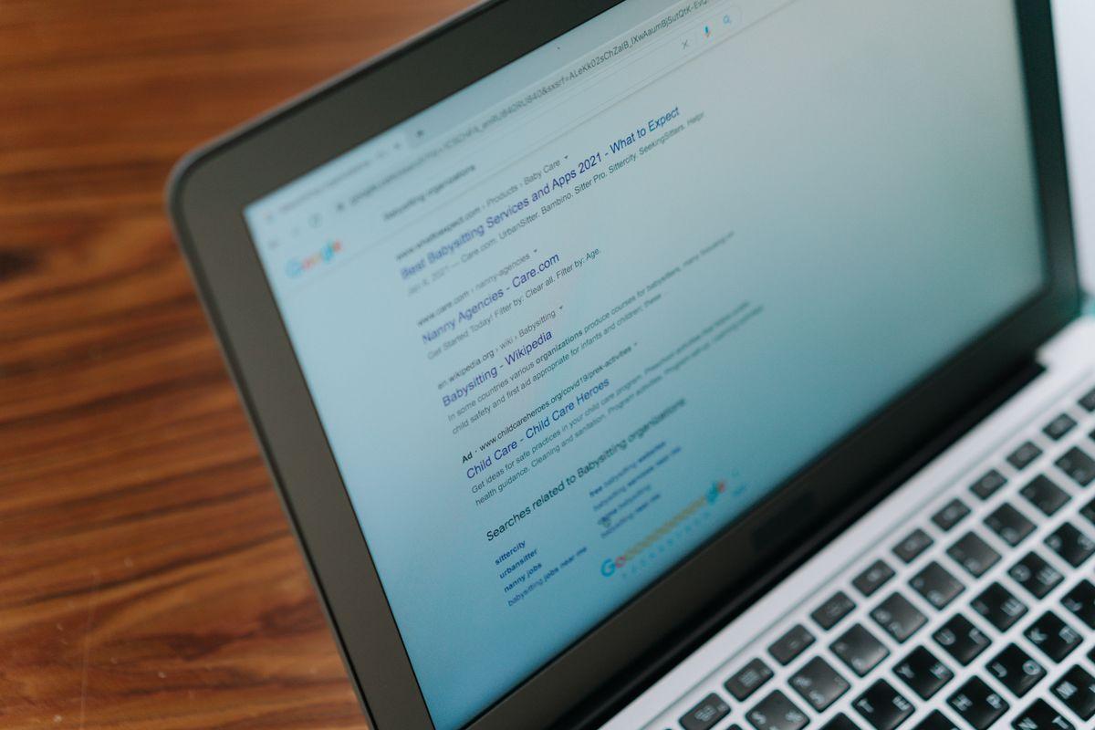 Laptop displaying search engine results after SEO optimization