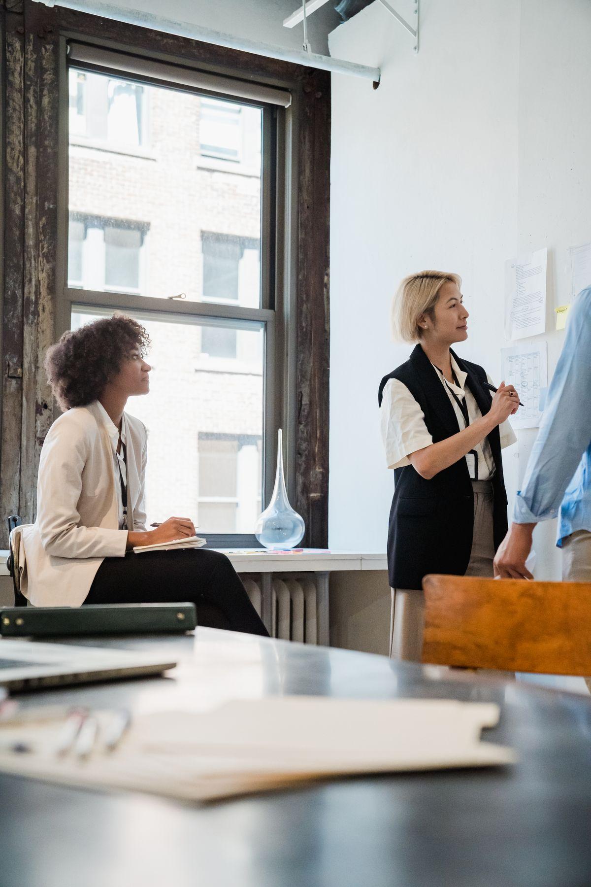 Specialists collaborating across SEO, PPC, and content teams